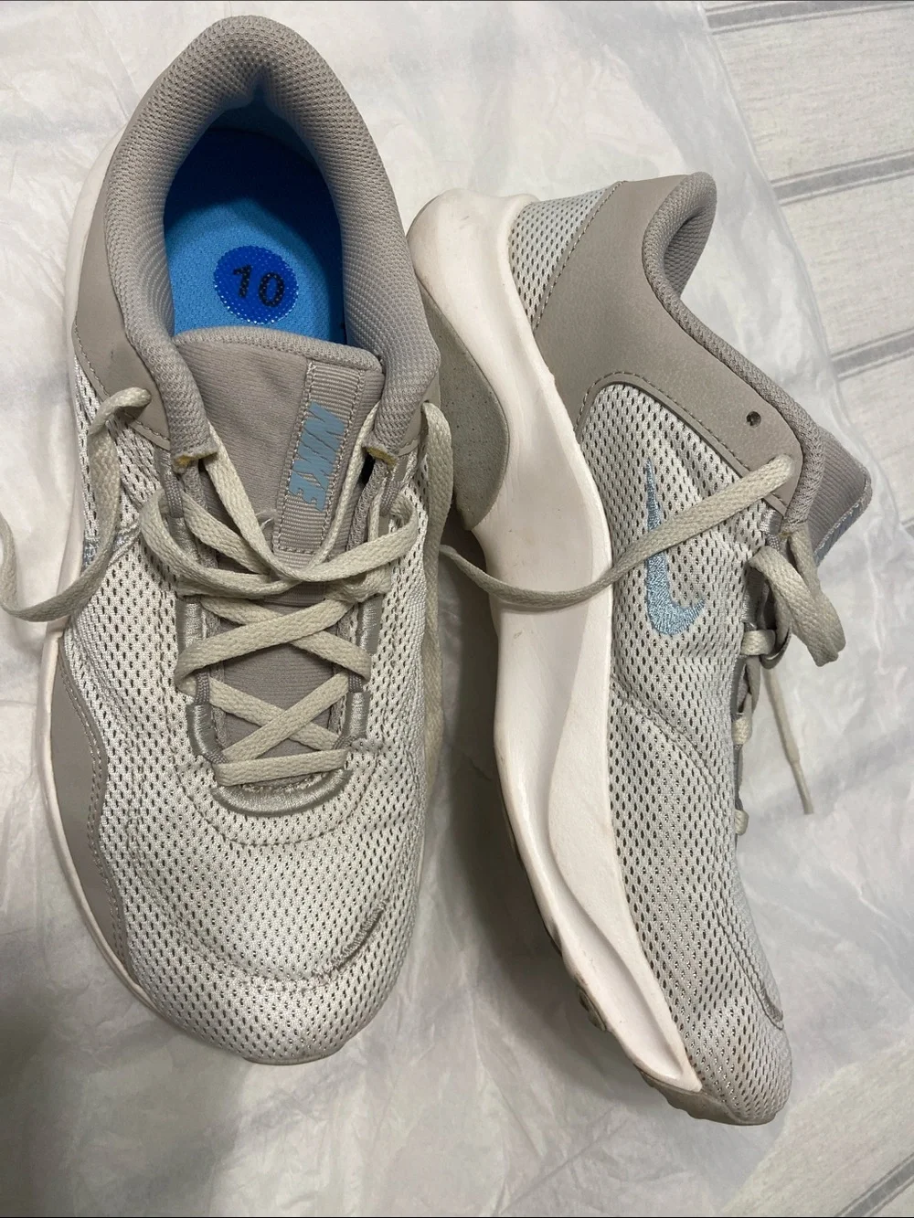 Nike women’s Light tan Mesh Sneaker with Subtle Silver Swoosh